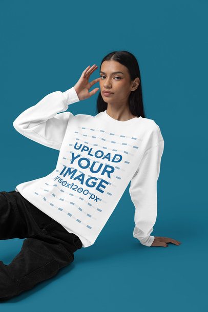 Comfort Colors Mockup of a Serious Woman in a Sweatshirt Sitting on the Floor m52972