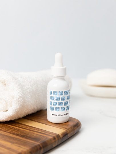 Retinol and Peptide Face Serum Mockup Featuring a Nice Aesthetic Bathroom m53605
