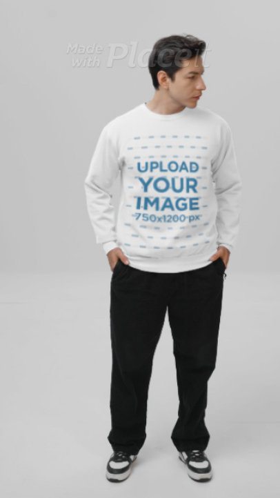 Video of a Man Posing in a Studio While Wearing a Comfort Colors Sweatshirt 9046v