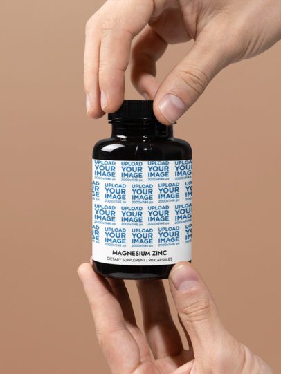 Magnesium Zinc Supplement Mockup Featuring a Pair of Hands Against a Customizable Background m53518