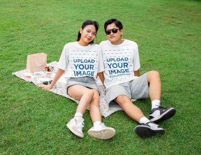 Oversized T-Shirt Mockup Featuring a Romantic Couple in a Valentine's Day Picnic