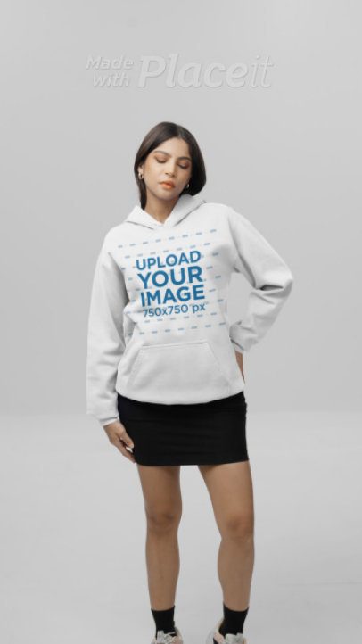 Comfort Colors Video of a Woman Posing in a Studio With a Pullover Hoodie 9053v