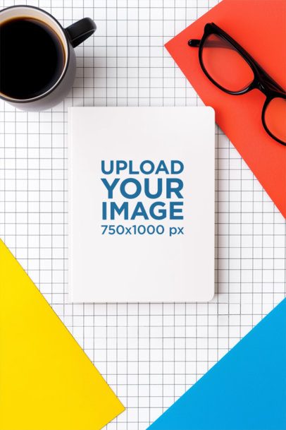 AI-Created Mockup Featuring a Journal Lying on a Surface With Colorful Sheets and a Cup of Coffee