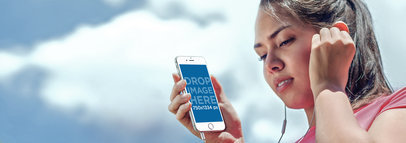 Mockup of a Young Female Athlete Using a White iPhone 6