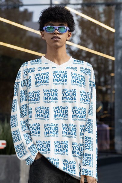 Hockey Jersey Mockup Featuring a Man With Sunglasses Posing in the Street m54449