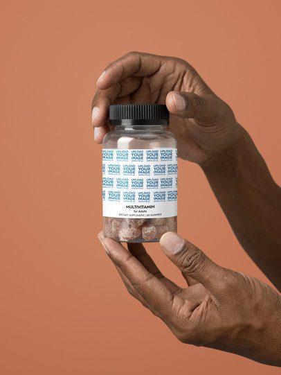 Multivitamin Gummies for Adults Supplement Mockup Featuring a Pair of Hands Against a Colorful Wall m53579
