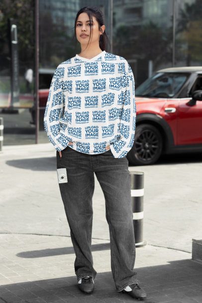 Mockup of a Woman Standing in the Street Wearing a Sublimated Hockey Jersey m54446