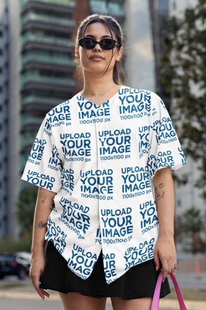 Baseball Jersey Mockup of a Woman With Tattoos and Sunglasses Posing in the Street m54453