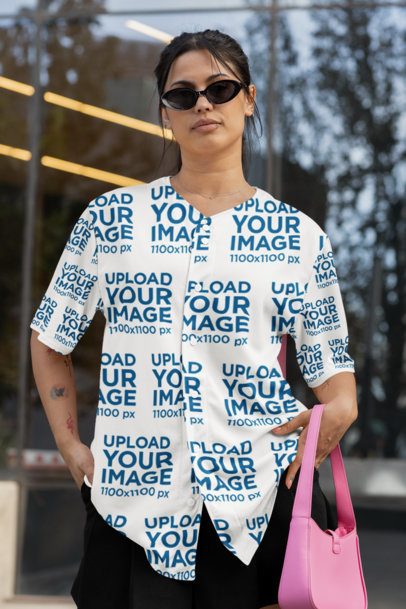 Baseball Jersey Mockup of a Tattooed Woman Posing in the Street With a Purse m54455