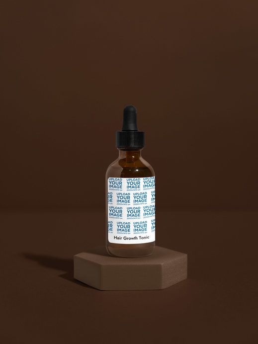 Hair Growth Tonic Mockup Featuring a Solid Color Base and Background