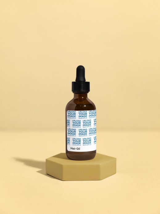 Hair Oil Mockup Featuring a Colorful Base and a Customizable Background