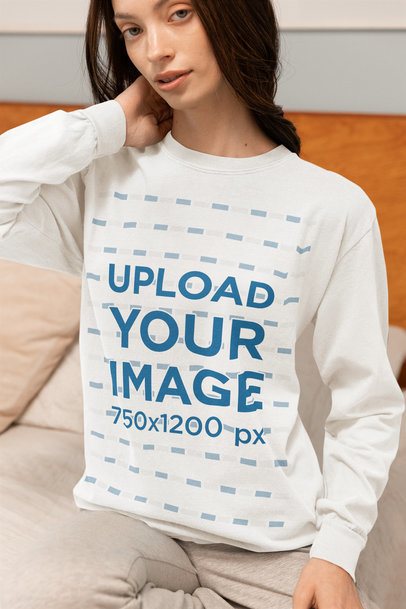 Comfort Colors Long-Sleeve Tee Mockup Featuring a Woman Sitting on a Bed in a Homemade Feel-Inspired Look m53790