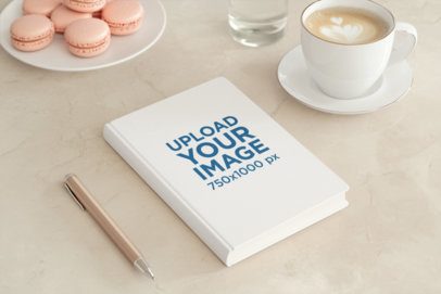 Mockup of an AI-Generated Journal Placed on a Table With a Latte and Some Macaroons m53843