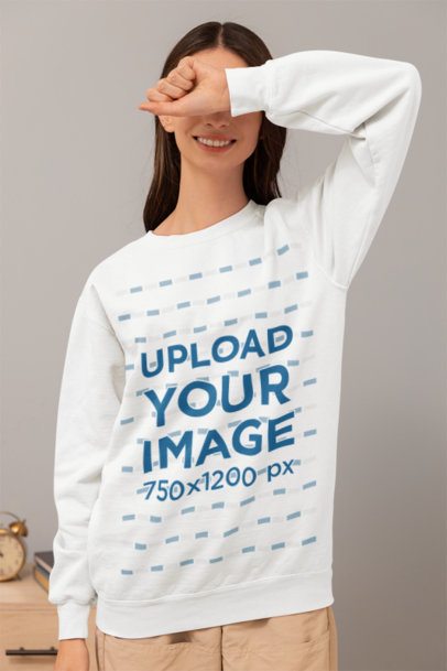 Comfort Colors Sweatshirt Mockup Featuring a Happy Woman Covering Her Face in a Homemade Feel Setting m53795