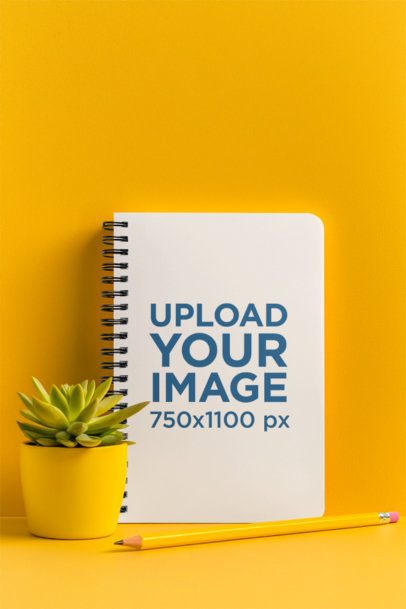 Mockup of an AI-Generated Spiral Journal Leaning Against a Colorful Wall m53846