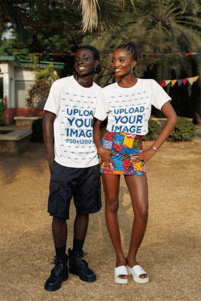 T-Shirt Mockup of a Stylish Couple Posing With Cheerful Looks