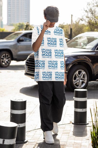 Basketball Jersey Mockup of a Man Walking in the Street m54445