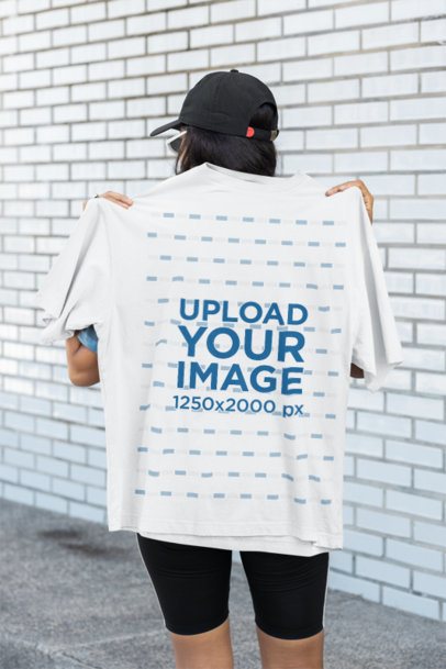 Oversized T-Shirt Mockup Featuring a Person Posing Backwards