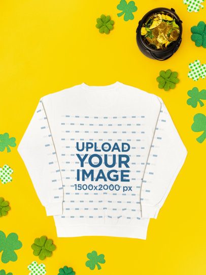 Mockup of a Comfort Colors Sweatshirt Lying on a St. Patrick's Day Background