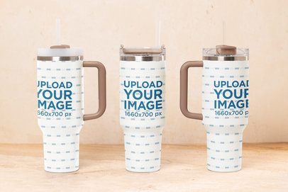 Mockup of Three Stanley Tumblers Placed on a Kitchen Table