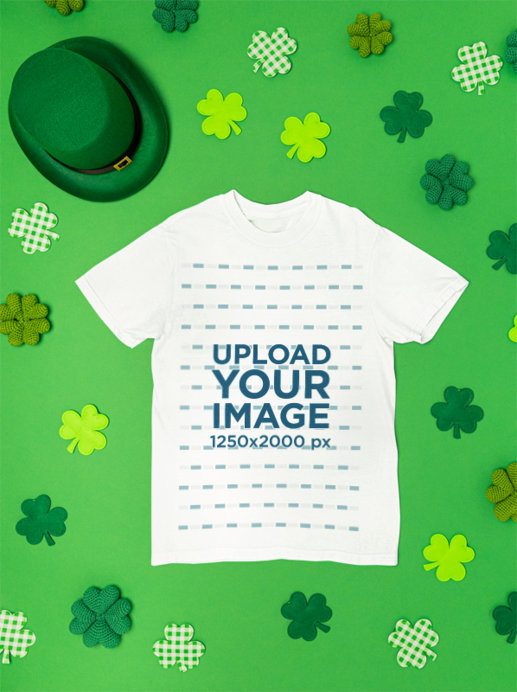 Mockup of a Comfort Colors T-Shirt Lying on a Surface With St. Patrick's Day Decorations