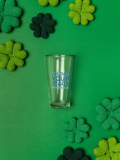 Drinkware Mockup Featuring a Shaker Pint Glass Placed on a St. Patrick's Day Setting