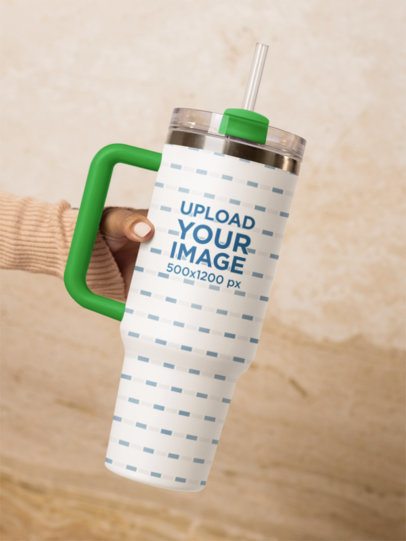 Mockup of a Woman With Painted Nails Holding a Stanley Tumbler