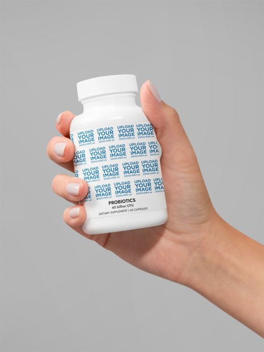 Probiotics Supplement Mockup Featuring a Woman's Hand With Painted Nails