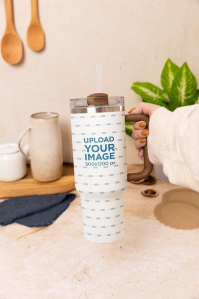Stanley Tumbler Mockup Featuring a Woman With Nice Painted Nails in a Kitchen Setting