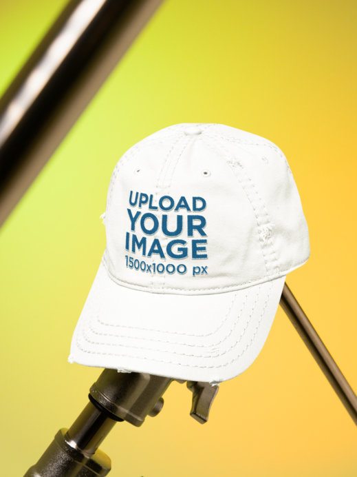 District Mockup Featuring a Distressed Cap Hat Placed on a Stick