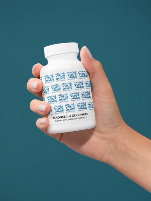 Magnesium Glycinate Supplement Mockup Featuring a Woman's Hand Against a Colorful Wall