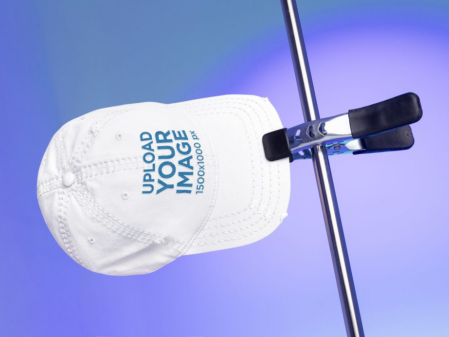 District Mockup Featuring a Distressed Cap Hanging on a Steel