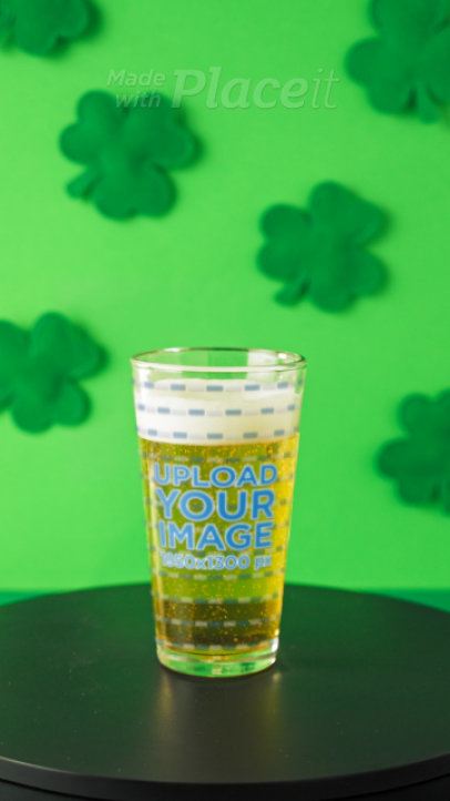 Video of a Spinning Shaker Pint Glass Filled With Beer in a St. Patrick's Day Setting 9087v