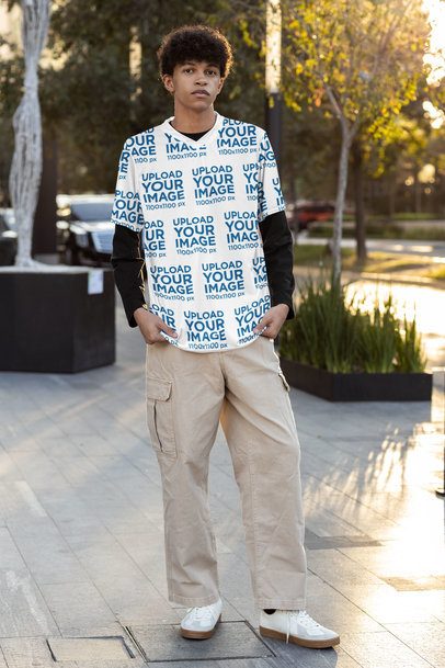Sports Jersey Mockup Featuring a Serious Man With His Hands on His Pockets Standing in the Street m54460