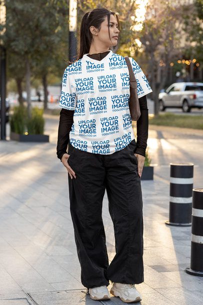 Sports Jersey Mockup of a Woman With a Ponytail Walking by the Street m54461