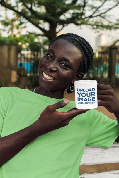 Mockup of a Happy Man Holding an 11 Oz Coffee Mug