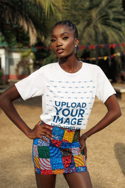 Round-Neck Tee Mockup Featuring a Woman Posing With Her Hands on Her Waist