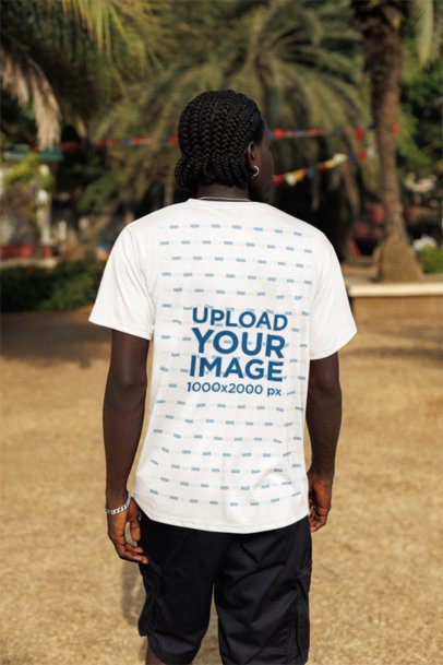 Back-View T-Shirt Mockup Featuring a Man With a Cornrow Braid Style