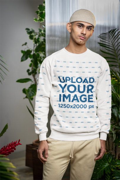 Comfort Colors Mockup of a Man Wearing a Sweatshirt Featuring Plants in the Back m54660