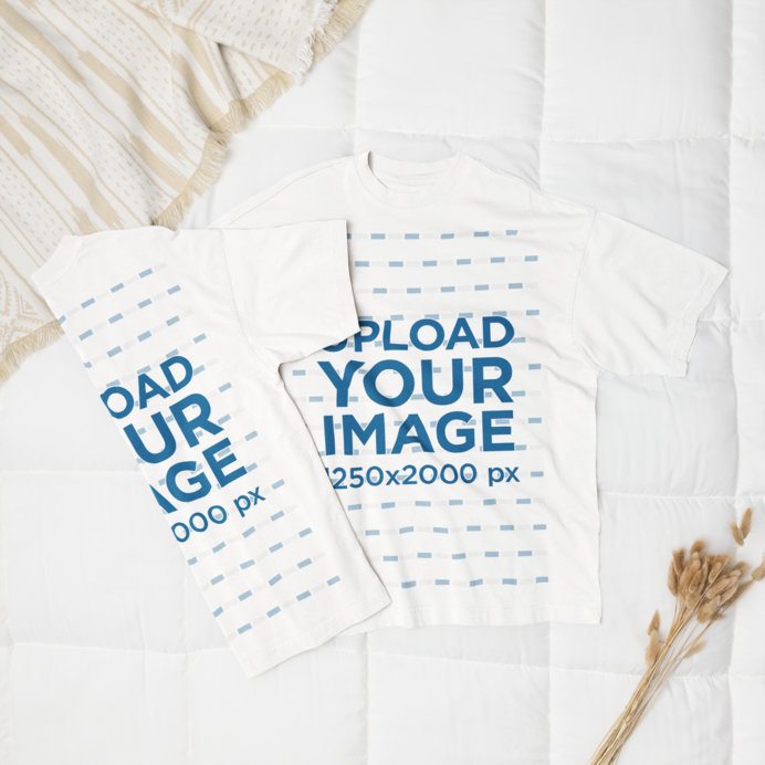 Mockup of Two Oversized T-Shirts Lying on a Cozy Bed