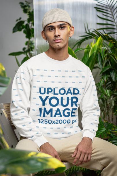 Comfort Colors Sweatshirt Mockup Featuring a Man Sitting on a Chair in a Garden m54662