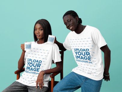 T-Shirt Mockup of a Serious Woman and a Happy Man Posing With Coffee Mugs in a Studio