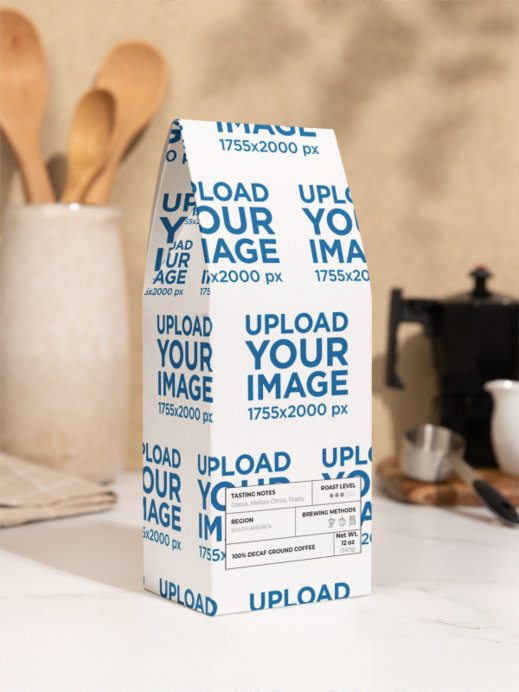 Trapper Peak Decaf Coffee Blend Mockup Featuring a Kitchen Setting and a Marble Table
