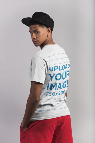 Back Shot T-Shirt Mockup of a Man with Beach Clothing