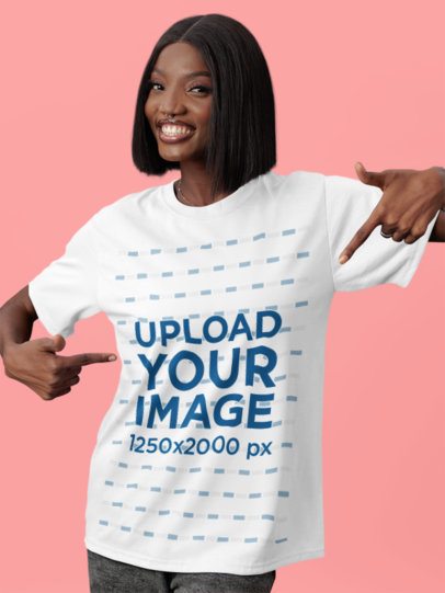 Round-Neck Tee Mockup Featuring a Happy Woman Pointing at Her T-Shirt