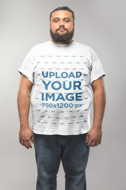 Front Shot of a Plus Size T-Shirt Mockup Featuring a Man in a White Room