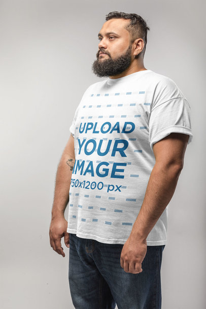 Angled Shot of a Plus Size T-Shirt Mockup Featuring a Man with a Beard