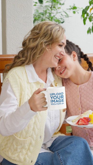 Video of a Woman Holding a Coffee Mug in a Mother's Day Garden Party