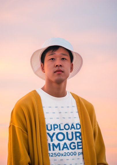 Round-Neck Tee Mockup Featuring an AI-Created Man Standing Against a Sunrise Sky