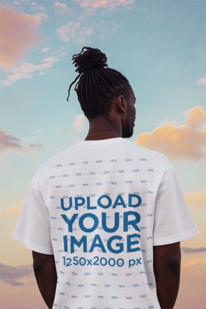 Back-View T-Shirt Mockup Featuring an AI-Created Man Looking at the Sky m52311